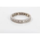 Diamond full band eternity ring with twenty single cut diamonds in grain setting.