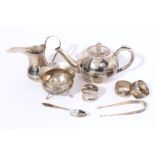 Middle Eastern three piece white metal tea set - comprising teapot of bullet form,
