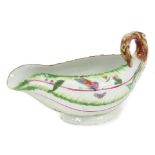 Mid-18th century Worcester moulded leaf-shaped sauce boat with stalk handle,