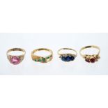 Four gold and gem set rings to include a ruby and diamond ring,