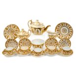 Fine early 19th century Minton New oval-shape tea service with gilt leaf and urn alternate panel