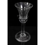 Mid-18th Century wine glass with trumpet bowl, air bubble to stem on domed foot, 16.