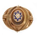 Victorian gold oval target brooch with a blue enamel and seed pearl star design,