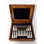 Victorian set of twelve pairs of dessert knives and forks with grape and vine engraved silver
