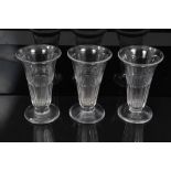 Set of ten George III syllabub flutes with slice cut decoration each on splayed foot, 10.