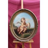Nineteenth century Continental school oval oil on canvas - a cherub playing a tambourine in coastal