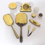 Selection of Art Deco period silver and yellow guilloche enamel dressing tableware - including a