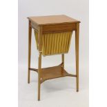 Regency-style satinwood worktable with patera inlaid top and work-in-progress basket,