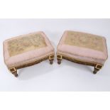 Unusual pair of 19th Century carved giltwood footstools each with tapestry top raised on shaped