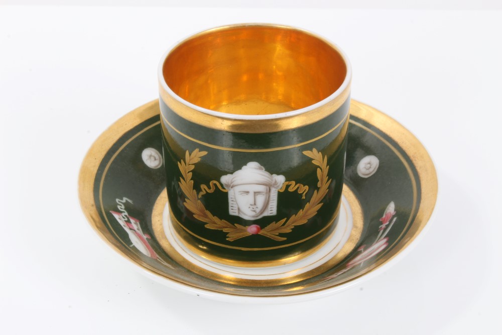 Early 19th century Paris porcelain coffee can and saucer decorated in the Etruscan style with