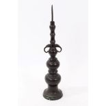 19th century Chinese bronze pricket candlestick, knopped form with twin mask loop handles,