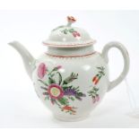 Mid-18th century Worcester polychrome teapot and cover with flower knop and painted floral spray