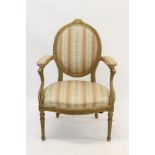George III giltwood open armchair in the Chippendale style, with pad back,