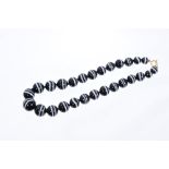 Banded agate bead necklace with a string of graduated double-banded agate beads measuring