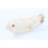 Fine Eskimo Greenland school carved whales tooth sculpture of a bird, signed W to base,