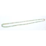 Old Chinese green jade / hardstone graduated bead necklace,