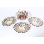 Three Edwardian silver bonbon dishes of oval form,