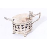 Edwardian silver mustard pot of oval form, with pierced decoration,