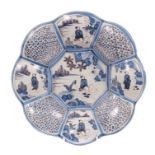 Fine late 17th century English Delft blue and white manganese lobed charger with segmented