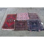 Belouch carpet bag square form with geometric ornament on aubergine ground, 63 x 72cm,