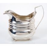 Late 19th / early 20th century silver cream jug of helmet form,