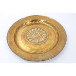 16th century Nuremberg brass alms dish with typical ornament,
