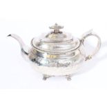 Regency period silver teapot of compressed baluster form,