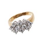 Diamond cluster ring with ten brilliant cut diamonds in claw setting on 18ct yellow gold shank.