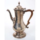 George III silver coffee pot of baluster form, with leaf-mounted bird-head spout,