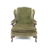 Victorian mahogany wing back armchair of deep proportions,