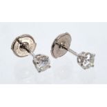 Pair of diamond single stone stud earrings,