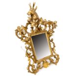Decorative 19th century Florentine carved giltwood wall mirror with bevelled plate and scrolling
