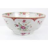 Mid-18th century Chinese export famille rose punch bowl with polychrome floral spray decoration,