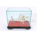 20th century Chinese white metal condiment set in the form a rickshaw,