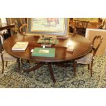 Very large Regency-style mahogany and line-inlaid circular dining table,