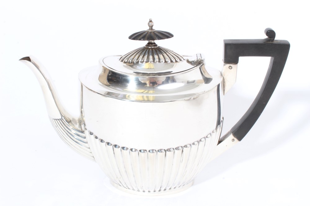 George V silver teapot of half fluted form with angular ebony handle and hinged domed and fluted - Image 2 of 13