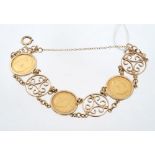 9ct gold bracelet with three gold half sovereigns interspaced by gold filigree panels