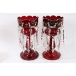 Pair of Mid-19th Century ruby glass lustres with gilt and enamel floral spray decoration and
