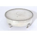 1920s silver trinket box of oval form, with hinged cover with engine-turned decoration,