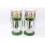 Pair of Victorian opaque and coloured glass lustres with children reserves and floral decoration on