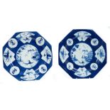 Pair 18th century Bow powder blue ground octagonal plates with Chinese landscape and floral