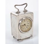 Edwardian miniature carriage clock with French movement and white engraved dial with Roman numerals,