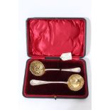Matching pair of Victorian Provincial silver sifter spoon and ladle with grape and vine silver gilt