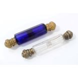 Victorian gilt metal mounted blue glass double-ended scent bottle of faceted form, 12cm long,