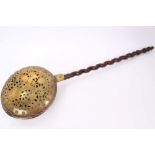 18th century Dutch brass and copper warming pan with pierced and engraved vase of flowers