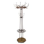 Unusual 19th century wrought iron hall stand with three over-scrolled uprights supporting hat and