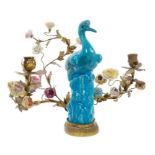 Late 19th century French Chinese-style and gilt metal mounted candelabrum with blue glazed heron on