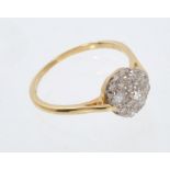 Diamond cluster ring with nine diamonds in claw setting on 18ct gold shank.