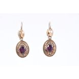 Pair Victorian gold and garnet pendant earrings,