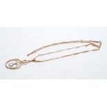 Edwardian rose gold and aquamarine pendant on rose gold fancy link chain with barrel clasp